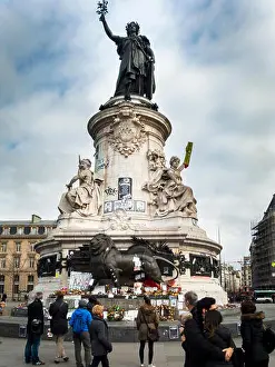Tanned Prints: Paris, France - February 15, 2015: Mother Marianne monument to French homeland in Place de la Republique