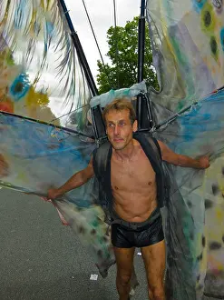 Alternative Lifestyle Prints: Paris, France, Gay Pride, LGTB March, Young Man Carrying Large Butterfly Wings in Parade