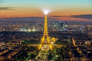 PARIS, FRANCE - May 5, 2016: Beautiful Paris skyline view Eiffel tower during light show at dusk, Paris, France