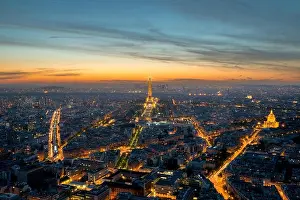 PARIS, FRANCE - May 5, 2016: Beautiful Paris skyline view Eiffel tower during light show at dusk, Paris, France