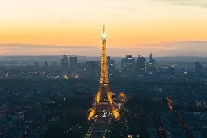 PARIS, FRANCE - May 5, 2016: Beautiful Paris skyline view Eiffel tower during light show at dusk, Paris, France