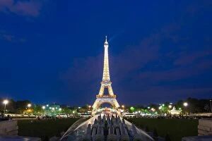 Images Dated 8th May 2016: PARIS, FRANCE - May 8, 2016: Tourist sightseeing beautiful night scene of illuminated Eiffel Tower