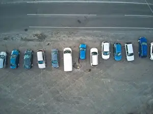 Parked cars aerial view in Australia in an open street location