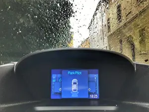 Stockimo Prints: Parking the car in the street with park pilot sensors and aid