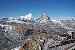 Cumulus Prints: Passengers alight from the Gornergrat Railway to be faced immediately with a great view of the Matterhorn