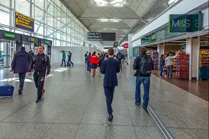 Travelers Prints: Passengers, walking towards departures, London Stansted Airport