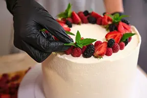 Velvet Prints: pastry chef black gloves making strawberry homemade white cream cake