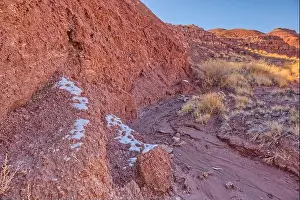 Moisture Prints: Patches of snow in the shade of a hill in Dead Wash at Petrified Forest National Park