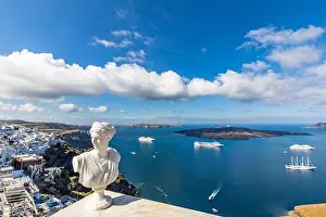 Fira Prints: Peaceful view in Santorini, Greece with white architecture and pink flowers