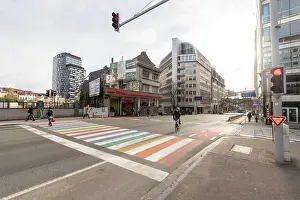 Intersection Prints: A pedestrian crossing in Brussels EU area with vibrant LGBT rainbow pattern