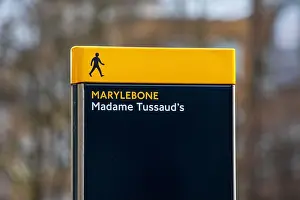A pedestrian sign outside Madame Tussauds in Marylebone, London, UK