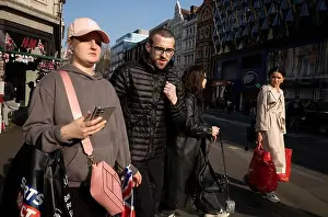 Oxford Street Prints: Pedestrians and tourists enjoying the late afternoon sunshine along Oxford Street on a Spring afternoon