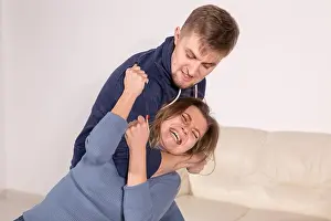 Hurt Prints: People, abuse and domestic violence concept - Portrait of man beating woman at home