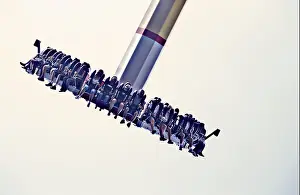 Exciting Prints: People enjoying an amusement park ride