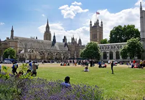 Houses Of Parliament Prints: People gather in Parliament Square, Westminister London House of Parliament in background