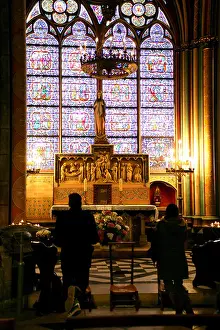 Kneel Prints: People praying in church, rear view