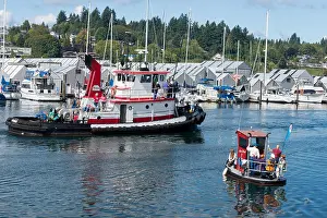 Tugboat Prints: People riding on tugboats during the annual Olympia Harbor Days festival in Olympia