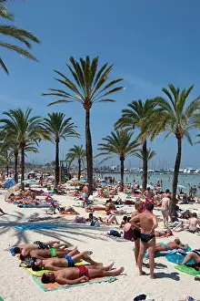 Arenal Prints: People sunbathing in Playa de Palma Arenal beach in Mallorca Majorca Balearic Spain