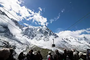Depot Prints: People are waiting for arrival of cable-car to the peak of mountain Mont Blanc