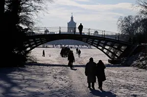 Schloss Prints: People walking on frozen lake at Charlottenburg Palace, Berlin