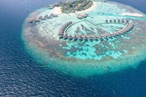 Images Dated 3rd May 2018: Perfect aerial landscape, luxury tropical resort or hotel with water villas
