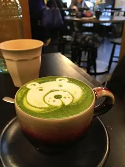 Latte Prints: Perfect cute bear matcha latte art in a cafe