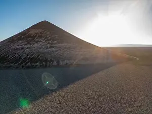 En Route Prints: Perfectly shaped Cono de Arita in the Salar de Arizaro in the morning - Exploring the Argentinian highlands called Puna