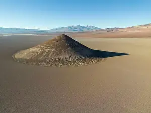En Route Prints: Perfectly shaped Cono de Arita in the Salar de Arizaro in the morning - Exploring the Argentinian highlands called Puna