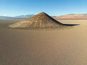 En Route Prints: Perfectly shaped Cono de Arita in the Salar de Arizaro in the morning - Exploring the Argentinian highlands called Puna