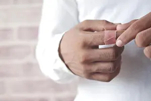 Injured Prints: person hands with gauze bandage wrapped around