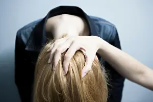 Femininity Prints: Person holding woman's head down