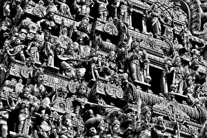 Surface Texture Prints: Perspective view of ancient temple tower with stone statues depicting Indian Hindu Gods