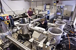 Laser Prints: PhD student during his research work adjusting his experimental setup