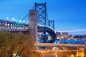 Philadelphia, Pennsylvania, USA at Benjamin Franklin Bridge spanning the Delaware River towards Camden, New Jersey