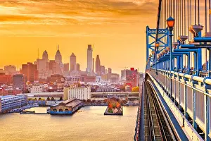 Philadelphia, Pennsylvania, USA downtown skyline from the Benjamin Franklin Bridge at twilight