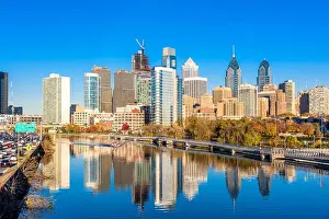 Philadelphia, Pennsylvania, USA downtown skyline at dusk on the Schuylkill River