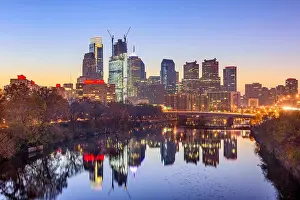Philadelphia, Pennsylvania, USA downtown skyline at dusk on the Schuylkill River