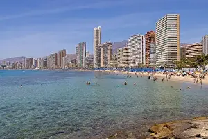 Summer Time Prints: Photo of the beautiful city of Benidorm in Spain in the summer time showing high rise apartments