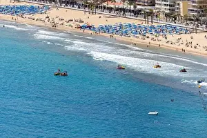 Alicante Prints: Photo of the city of Benidorm in Spain in the summer time showing people on the famous Levante Beach