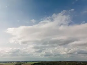 Morning Sky Prints: Photo from a flying drone, blue sky and white clouds. Texture background for design