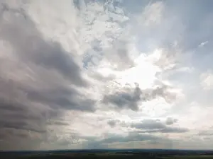Morning Sky Prints: Photo from a flying drone, blue sky and white clouds. Texture background for design