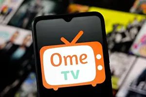 Mobile Phone Prints: In this photo illustration, the OmeTV (Ome TV) logo is seen displayed on a smartphone screen