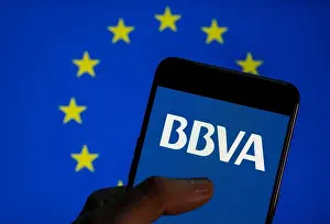 Eu Flag Prints: In this photo illustration the Spanish multinational BBVA bank logo is seen on an Android mobile device screen with