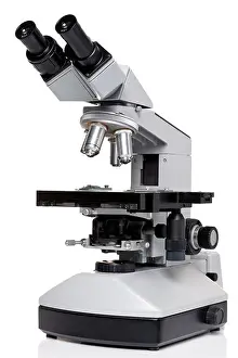 Microscopy Prints: Photo of a professional ocular laboratory microscope with stereo eyepiece isolated on a white background