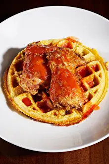Waffle Prints: Photograph looking down at a waffle with fried chicken on top