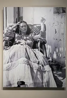 Mexico City Prints: Photograph of Mexican artist Frida Kahlo by Nickolas Muray displayed at her original home in Coyoacan