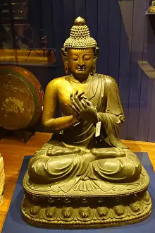 1935 Prints: This photograph taken during the 1935 Sven Hedin expedition to China depicts a Buddha statue