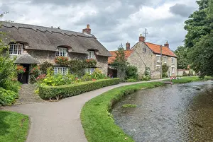 Cottage Prints: A well photographed thatched cottage next to Thornton Beck in the small North Yorkshire village of Thornton le Dale
