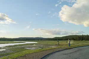 Yellowstone Prints: photographer man with cameras