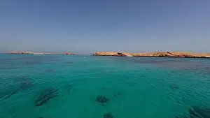 Water Edge Prints: Photography of small islands sanctuary in Oman near Muscat shot from a boat during spring sunny day